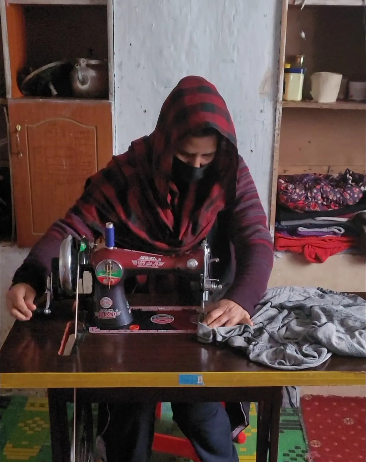 Learn how Maryam from Kabul, with the help of a sewing machine, is striving for financial independence and overcoming economic challenges